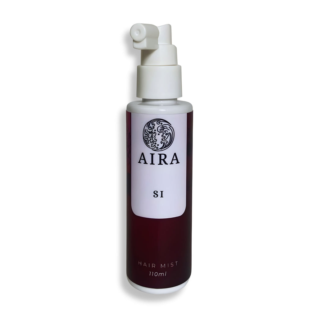 Hair mist bottle Si 'AIRA' on a white background