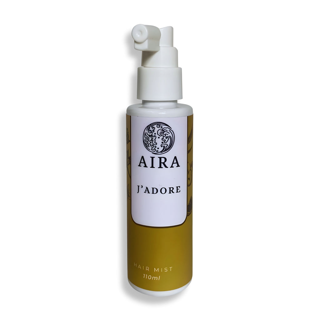 AIRA J'Adore hair mist bottle on a white background