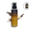 Aira Spice Bomb Extreme body splash bottle with spices and vanilla flowers on a white background