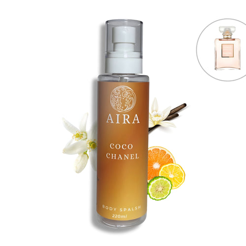 AIRA Coco Chanel body splash bottle with floral and fruit elements on a white background