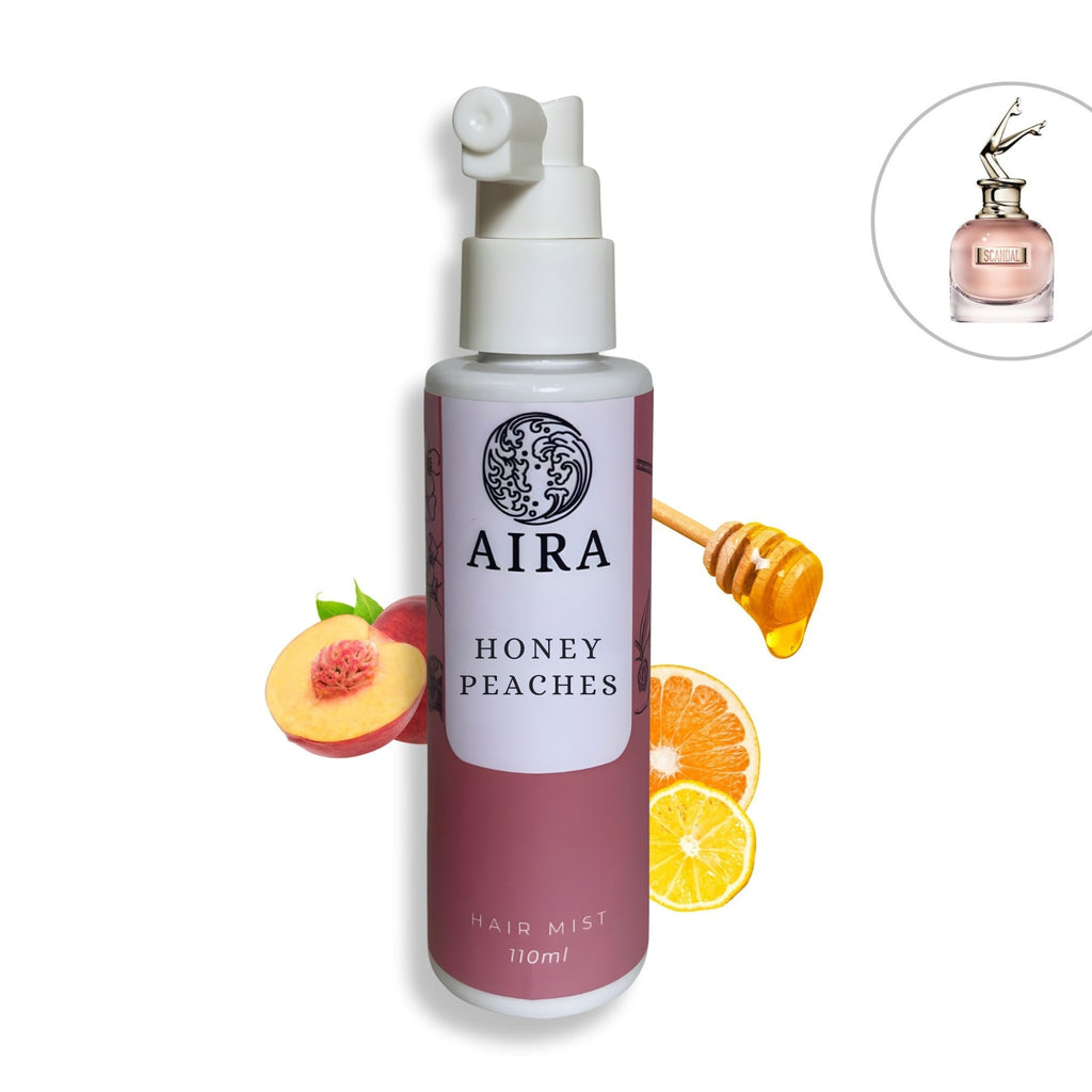 AIRA Honey Peaches hair mist bottle with fruit illustrations on a white background Scandal 