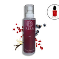 Aira body spalsh bottle with red berries and vanilla flower on a white background SI