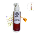Aira Honey Wildflower hair mist bottle with honey and floral elements on a white background