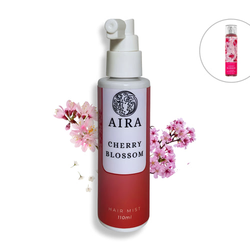 AIRA Cherry Blossom hair mist bottle with cherry blossoms on a white background