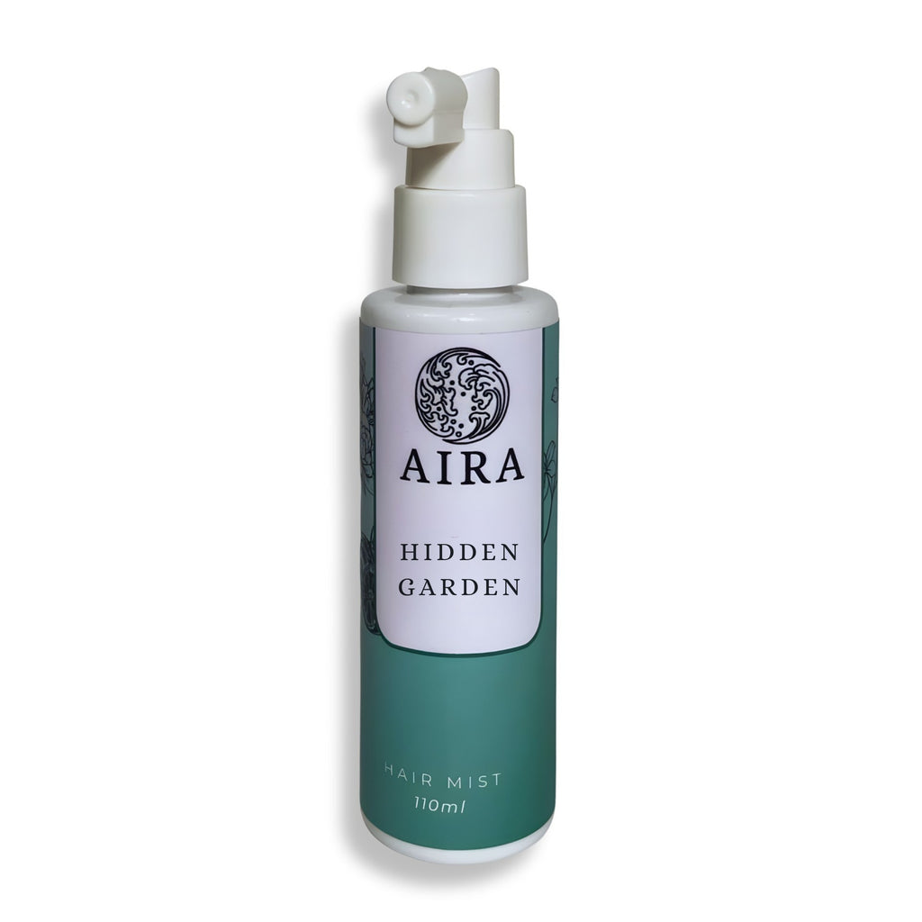 Aira Hidden Garden hair mist bottle on a white background