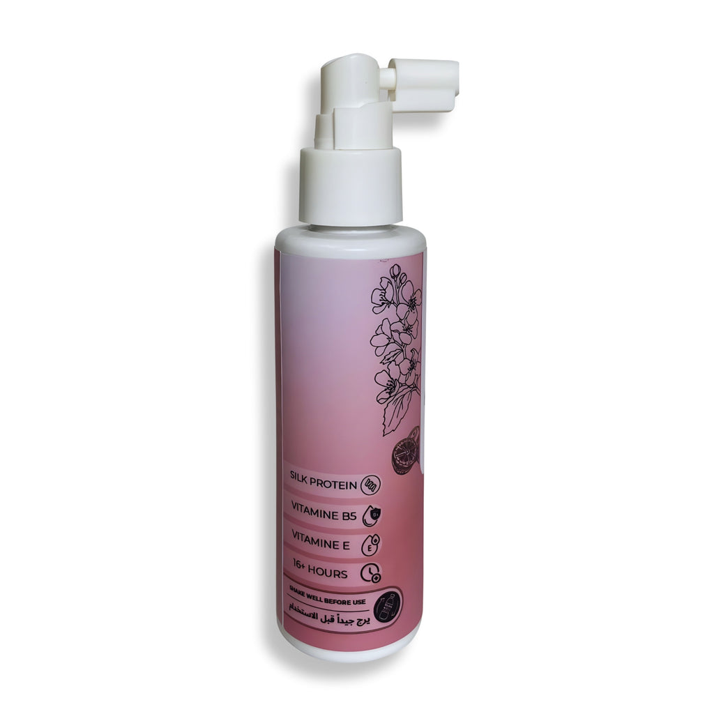 Hair mist bottle with white pump on a white background