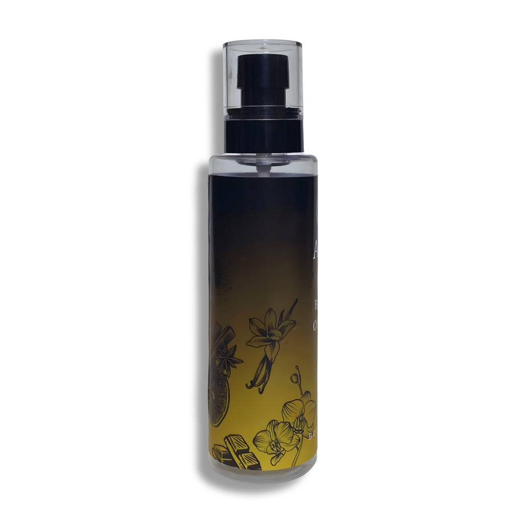 Body splash bottle with black cap on a white background
