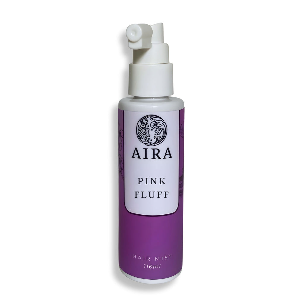 Aira Pink Fluff hair mist bottle on a white background 