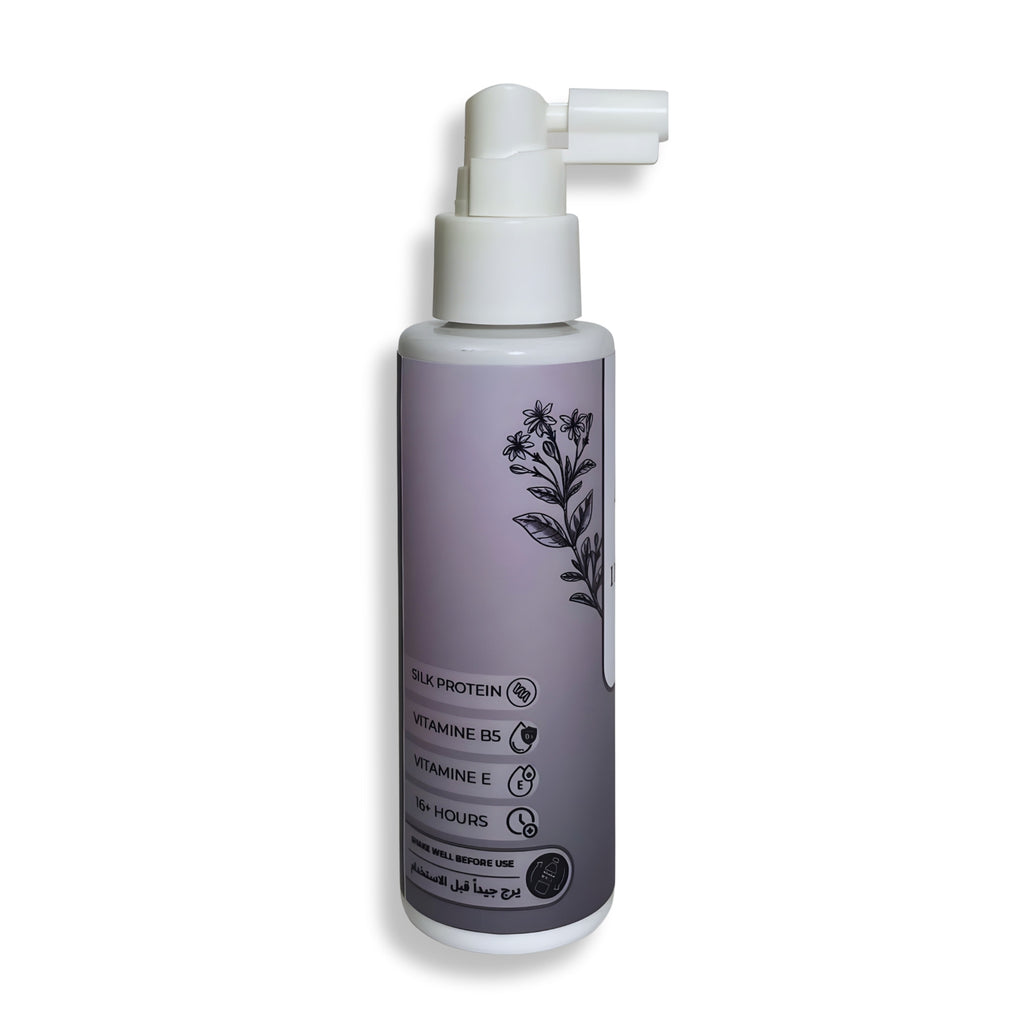 Hair mist serum bottle with label on a white background