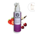 Aira Velvet Berry hair mist bottle with strawberry, cherry, and vanilla elements on a white background Burberry Her